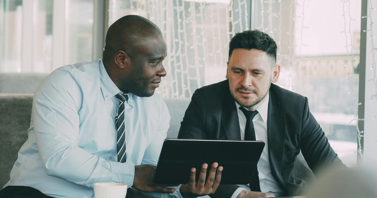 The holdback two business men talking